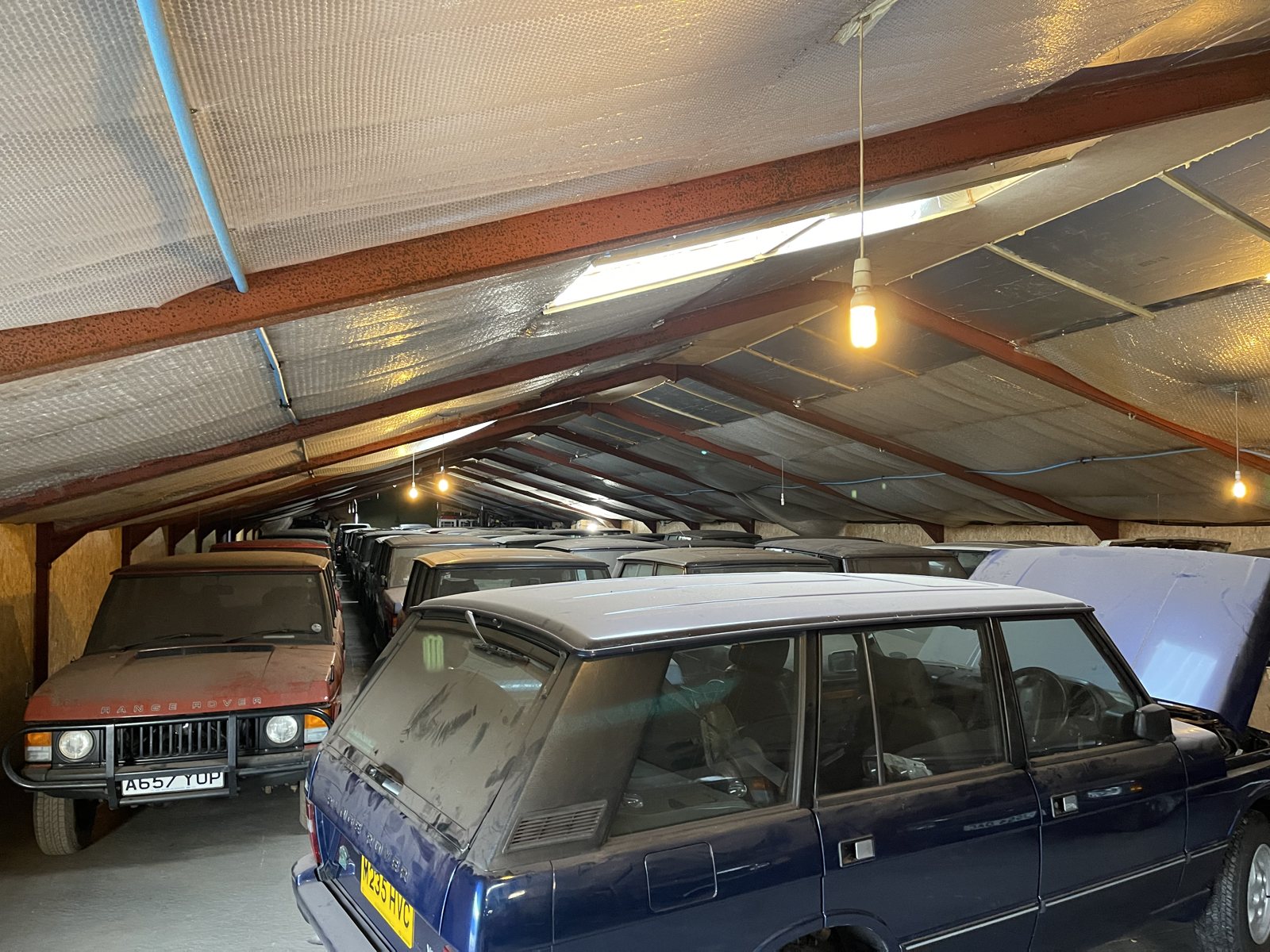 Classic Range Rovers kept dry and stored in a barn